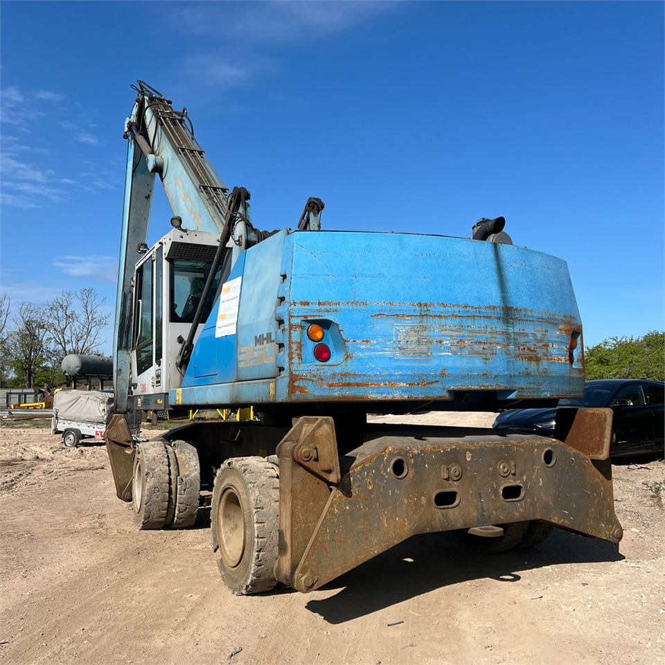 Fuchs MHL350 - Manipulador de materiales: foto 4 Fuchs MHL350 - Manipulador de materiales: foto 4