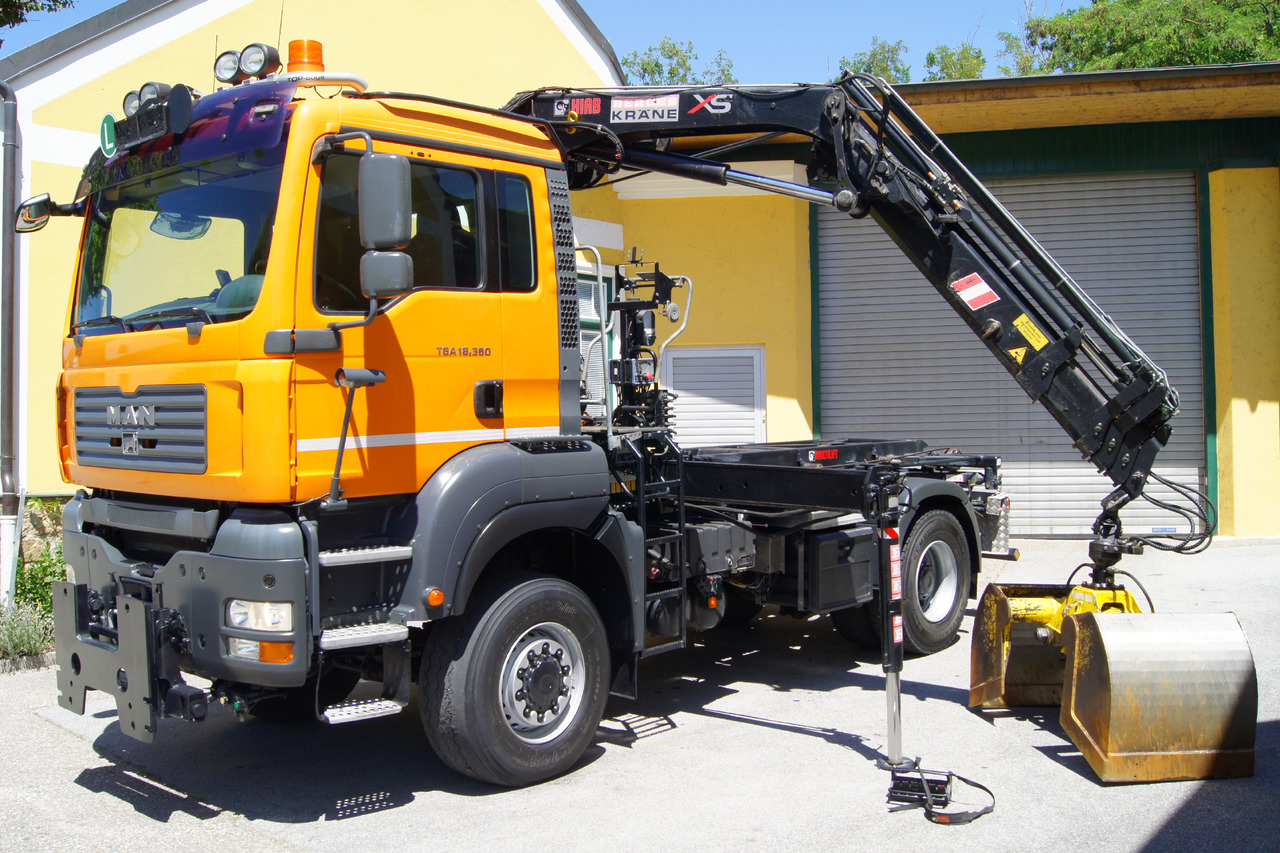 MAN TGA 18.360 BL 4x4/Euro 4/TÜV/HIAB 111/MULTILIFT/Winterdienst - Camión multibasculante, Camión grúa: foto 2 MAN TGA 18.360 BL 4x4/Euro 4/TÜV/HIAB 111/MULTILIFT/Winterdienst - Camión multibasculante, Camión grúa: foto 2