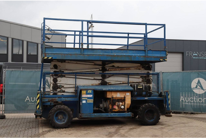 Holland lift COMBISTAR B-195DL25-4WD/P/N - Plataforma de tijeras: foto 1 Holland lift COMBISTAR B-195DL25-4WD/P/N - Plataforma de tijeras: foto 1