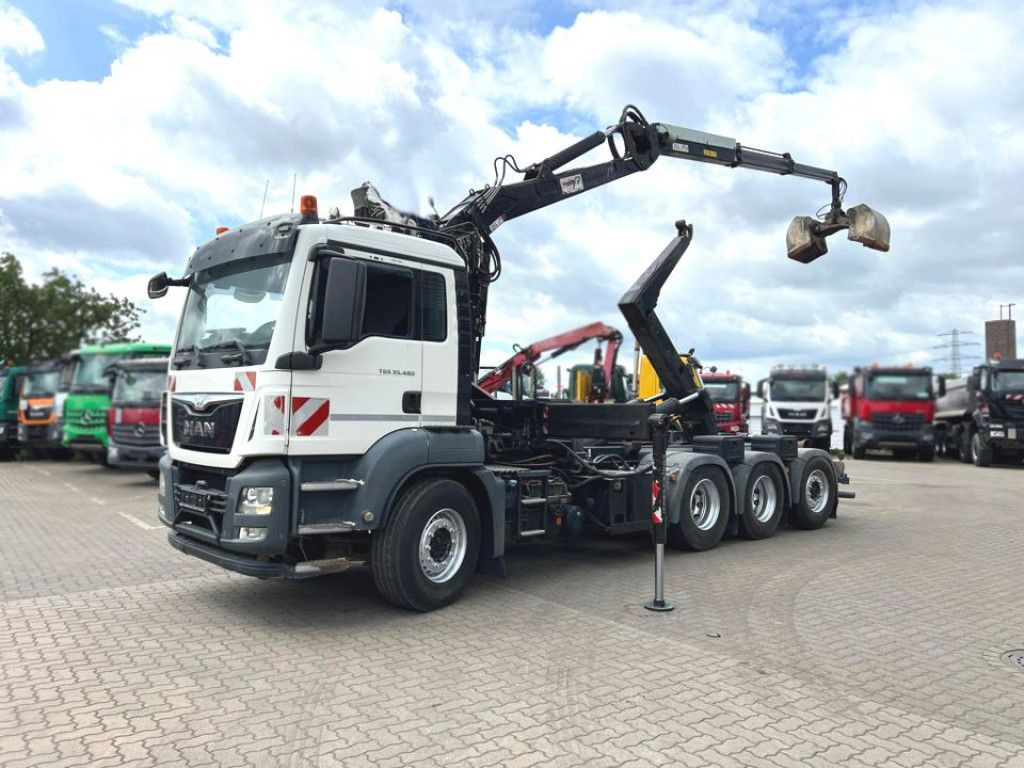 MAN TG-S 35.480 8x4 BL Abrollkipper mit Kran Penz-15 - Camión multibasculante, Camión grúa: foto 1 MAN TG-S 35.480 8x4 BL Abrollkipper mit Kran Penz-15 - Camión multibasculante, Camión grúa: foto 1